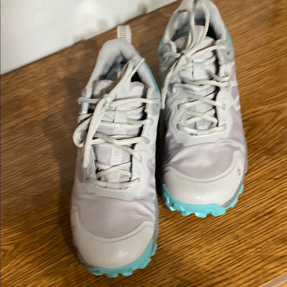 White and Blue Athletic Shoes with Streamlined Silhouette